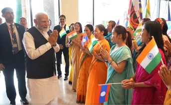 PM Modi Interacts With Indian Diaspora From Laos, Receives Blessings By Buddhist Monks