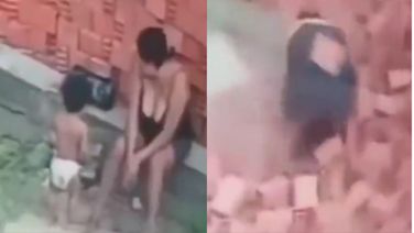 Watch: Woman Saves Her Child From Being Crushed Under Bricks