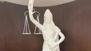 Lady Justice In SC Library Now Holds A Constitution With Open Eyes