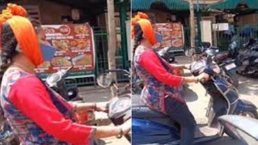 Viral Video: Bengaluru Woman Slammed For Phone 'Desi Jugaad' On Moving Scooter