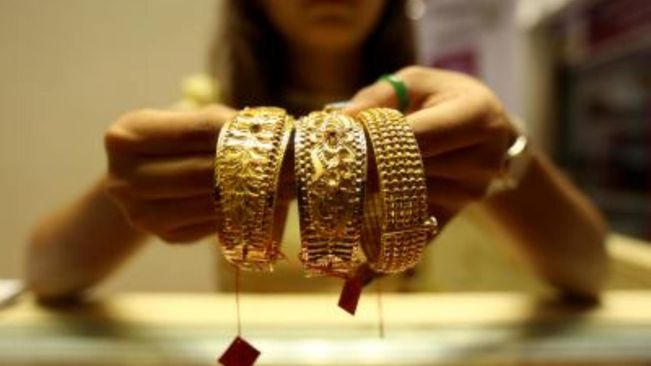 Gold price surges to record high