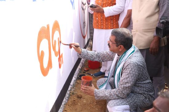 Pradhan Launches 'Kantha Likhan' In Deogarh, Draws Lotus On Wall