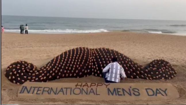 Sudarshan erects giant sand art of moustache on International Men’s Day