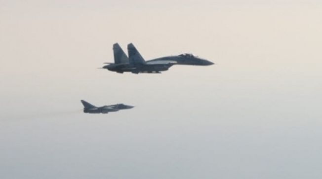 Russia threatens to destroy Ukraine jets after Poland, Slovakia pledges