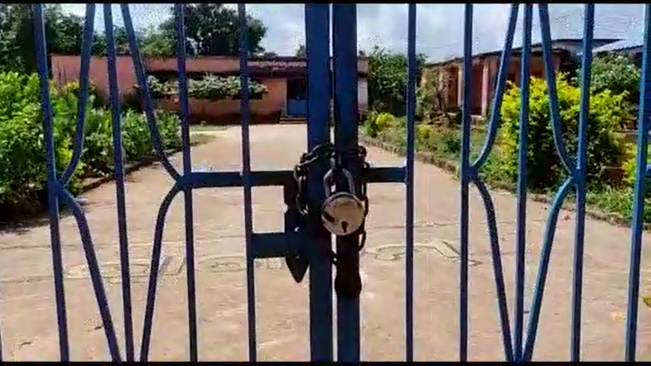 The main gate of the school was locked