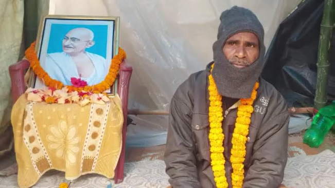 The old man went on a hunger strike demanding the removal of the road