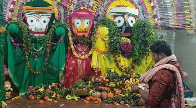 A crowd of devotees at the historic Jagannath temple in Boudh district